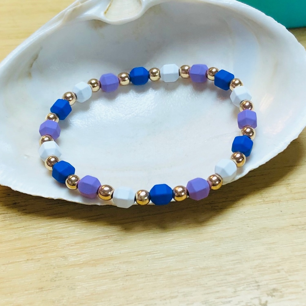 Hematite color and gold bracelet